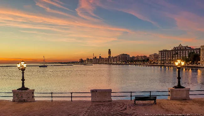 San Nicola pier at dawn: street lamps and seafront, Bari