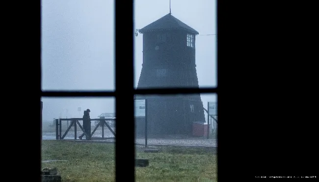 A watchtower seen from inside a shack in the Majdanek camp