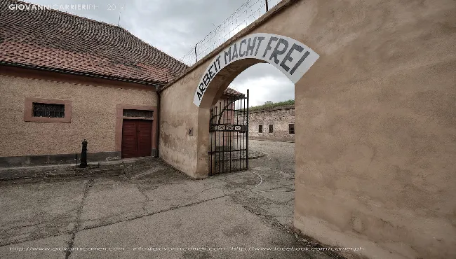 The main entrance and the block A - Arbeit Macht Frei sign