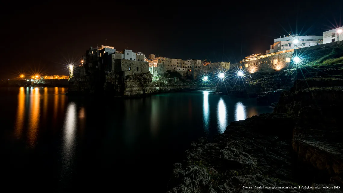 Night over Polignano between sea and lights