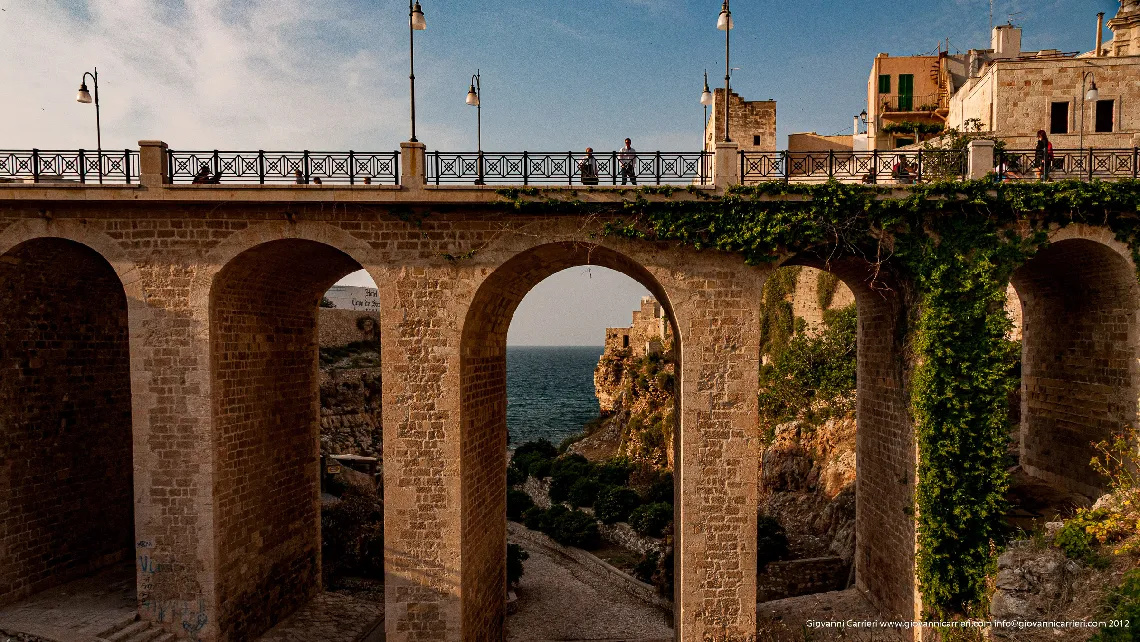 The Borbonic bridge and the Cala Monachile of Polignano