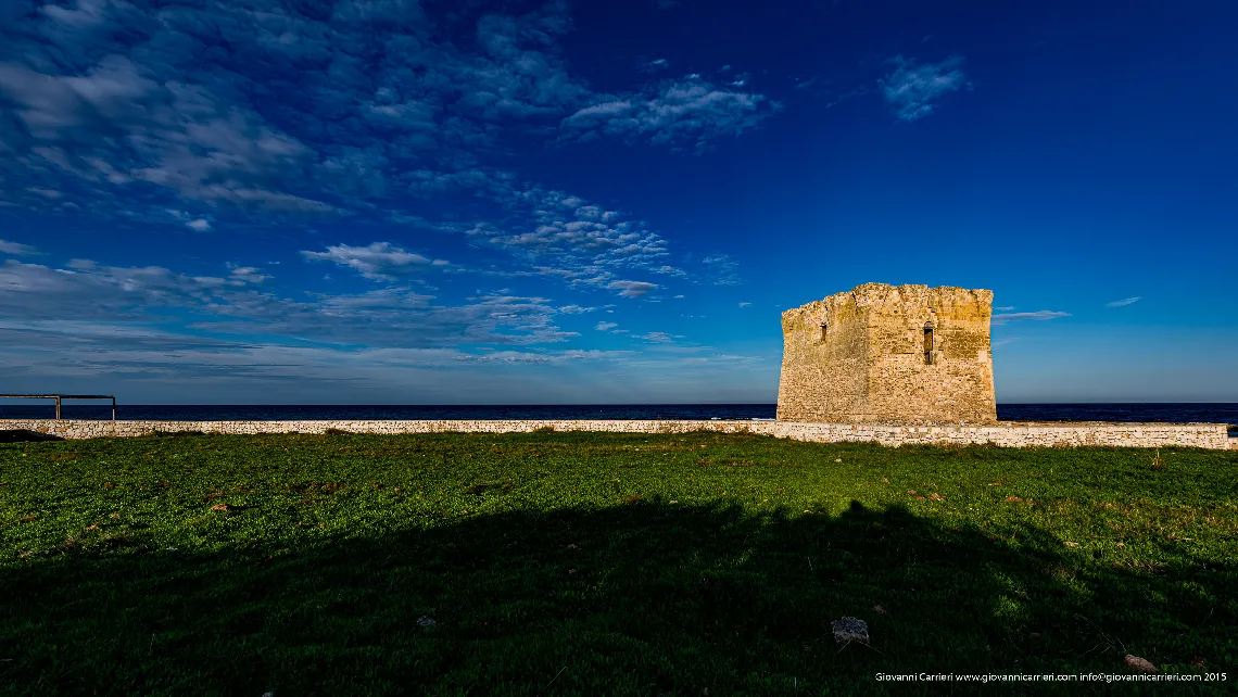 San Vito, the tower and the sea of Polignano a Mare