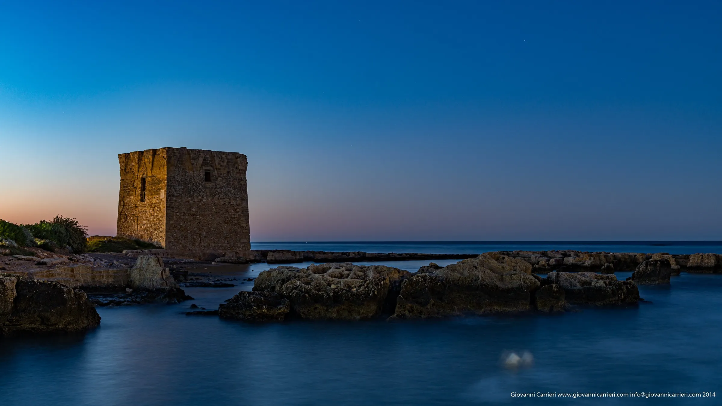 The autumn twilight casts its light on San Vito, Polignano a Mare