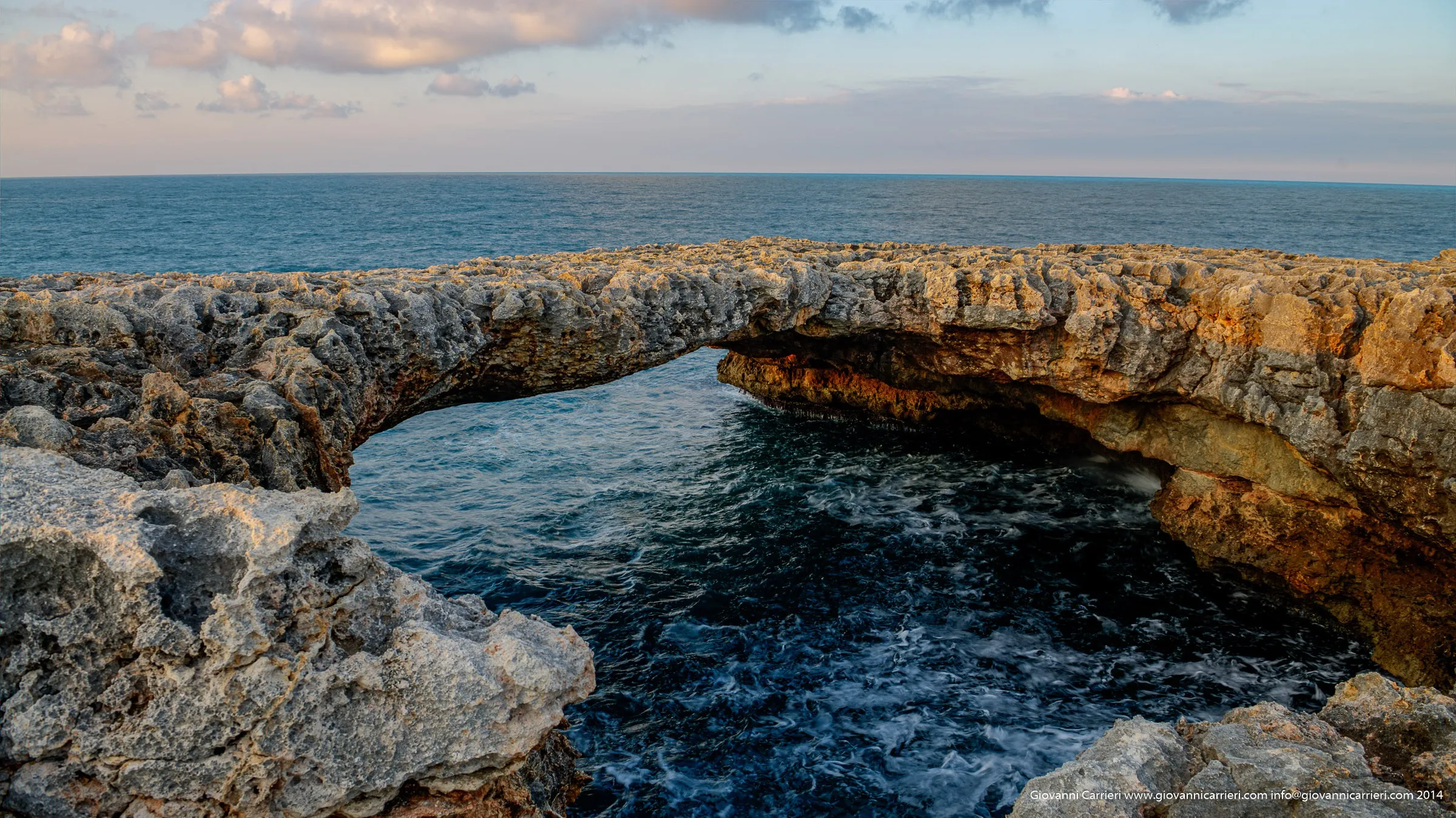 The stone bridge with the rock hermit - Polignano a Mare
