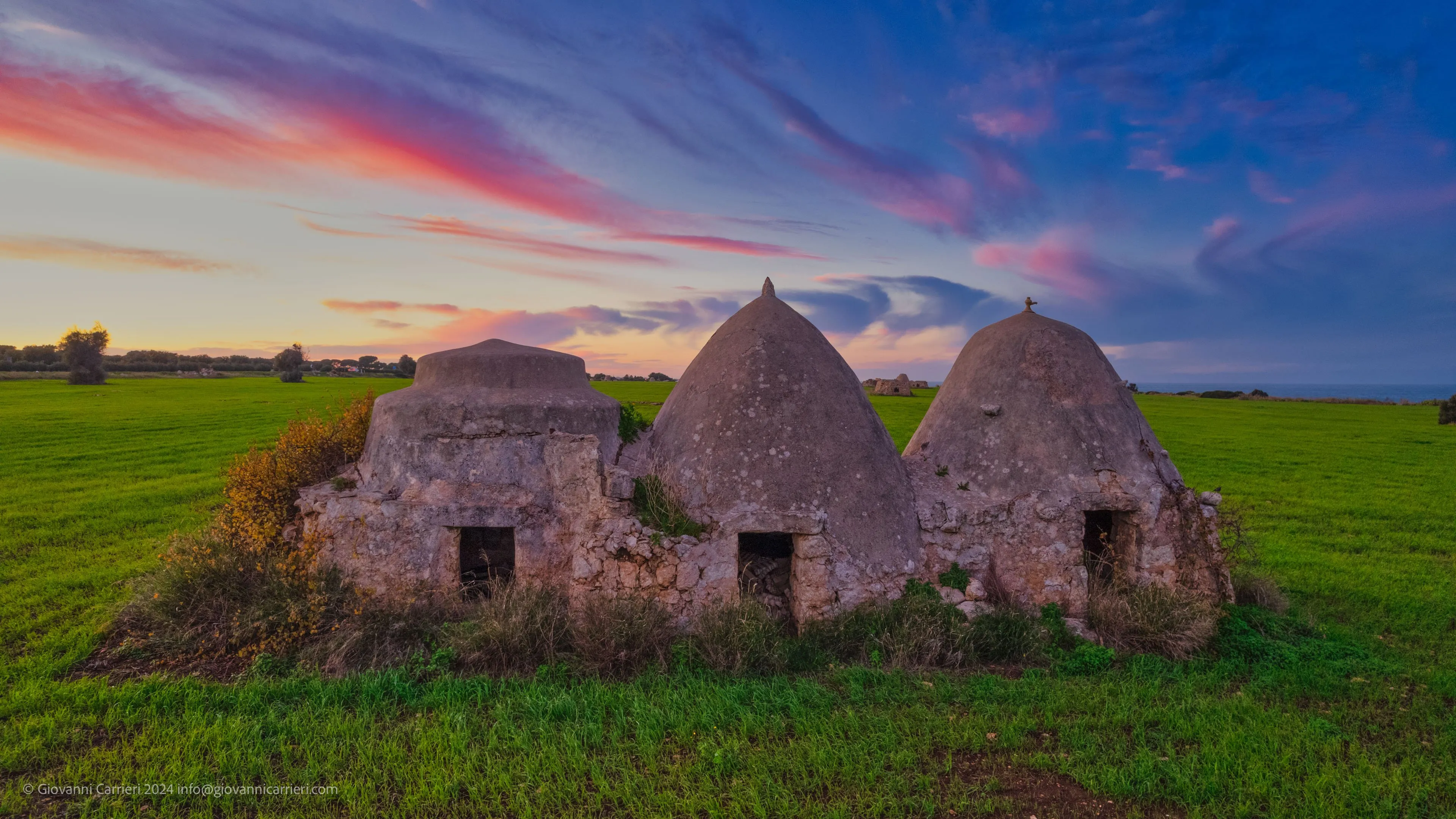 Trulli at sunset on the Costa Ripagnola