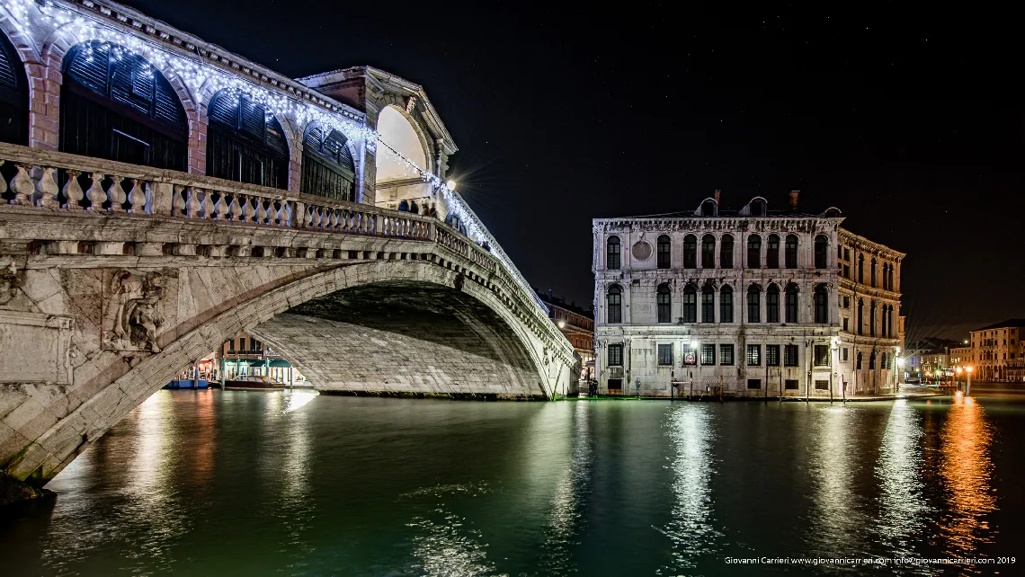 The Rialto Bridge seen from the shore of the Grand Canal - Venice