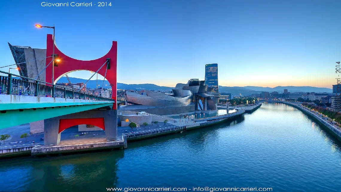 The view of Bilbao: the Nervion River, the bridge De la Salve, the Guggenheim Museum and the skyscraper Iberdrola