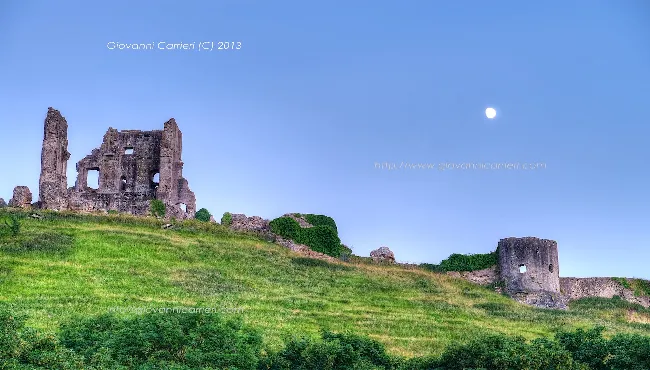Corfe Castle ruins in the moonlight