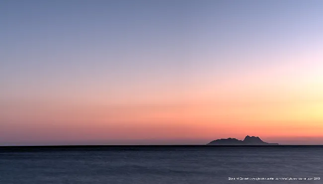 Minimalist sunset over Paximadia islands