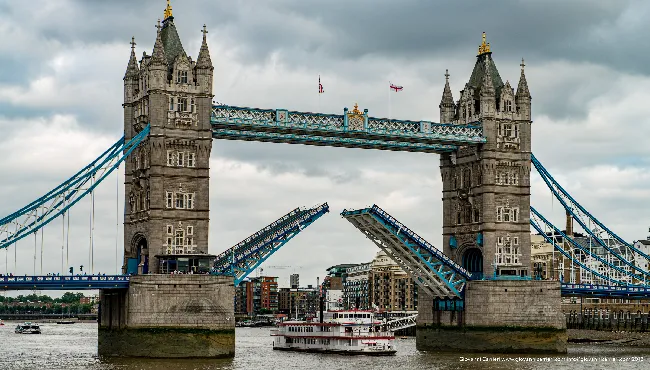 Tower Bridge open with ship in transit
