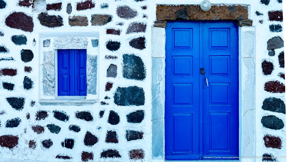 Door of the church overlooking the sea in Akrotiri - Santorini